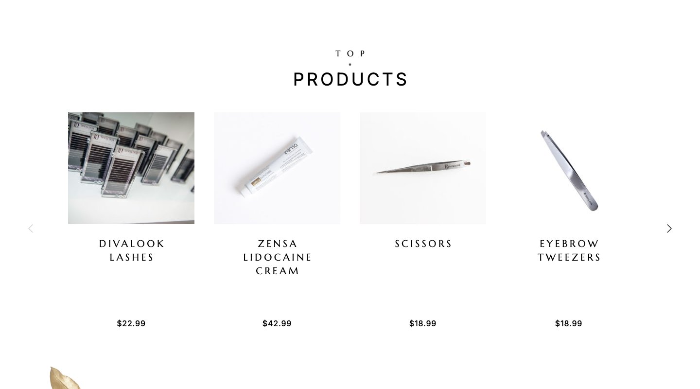 The “Top products” section on the homepage: four shop products, with photograph, name and price, in the same typography as the rest of the site